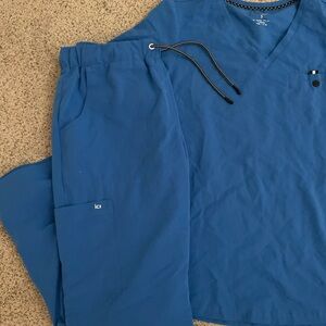 KOI royal blue scrub set size small